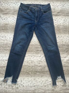 American Eagle Outfitters Women's Indigo Skinny Jeans with Frayed Ankles